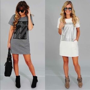 Hope’s gray and black ‘good vibes’ dress